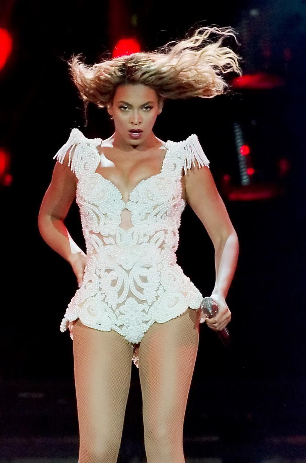 16P Beyonce Knowles wearing fishnets  various sexy bodysuits on stage at the Budweis