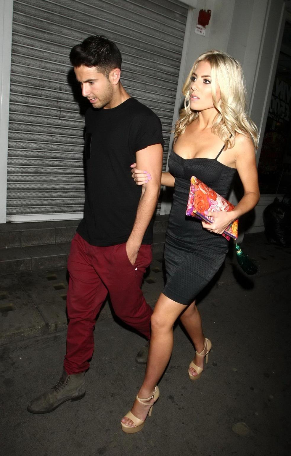 16P Mollie King busty wearing a low cut mini dress at the Arts Club in London