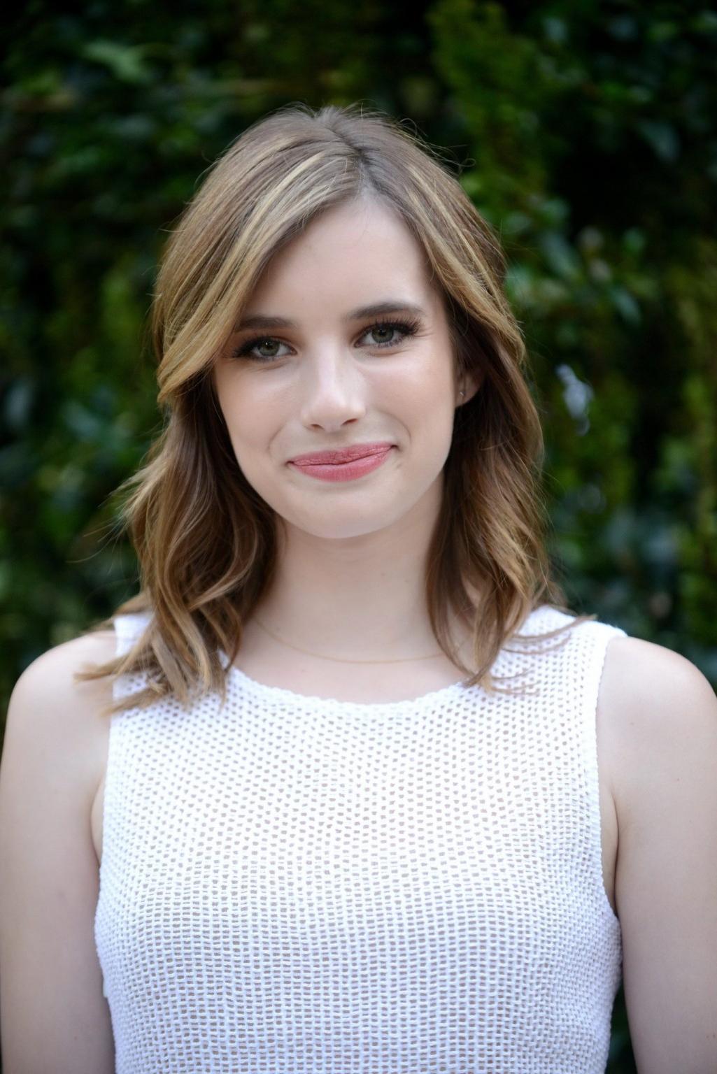 16P Emma Roberts looks hot wearing white fishnet mini dress at the NRDC Chanel Dinne