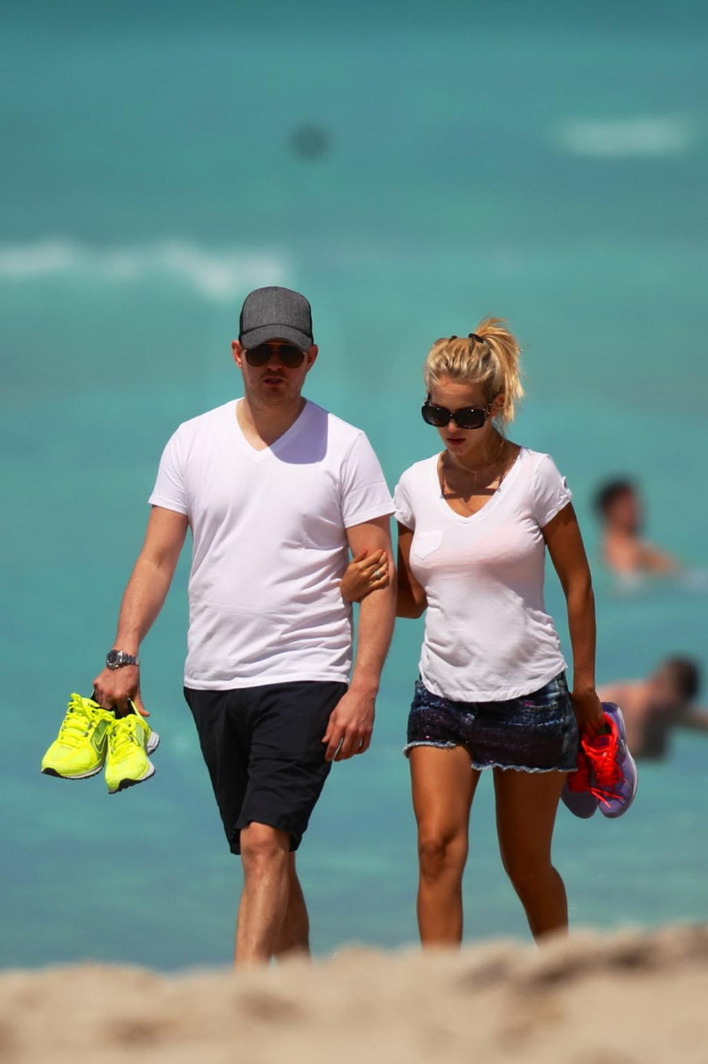 16P Luisana Lopilato in hotpants  c-thru T-shirt strolling down Miami Beach