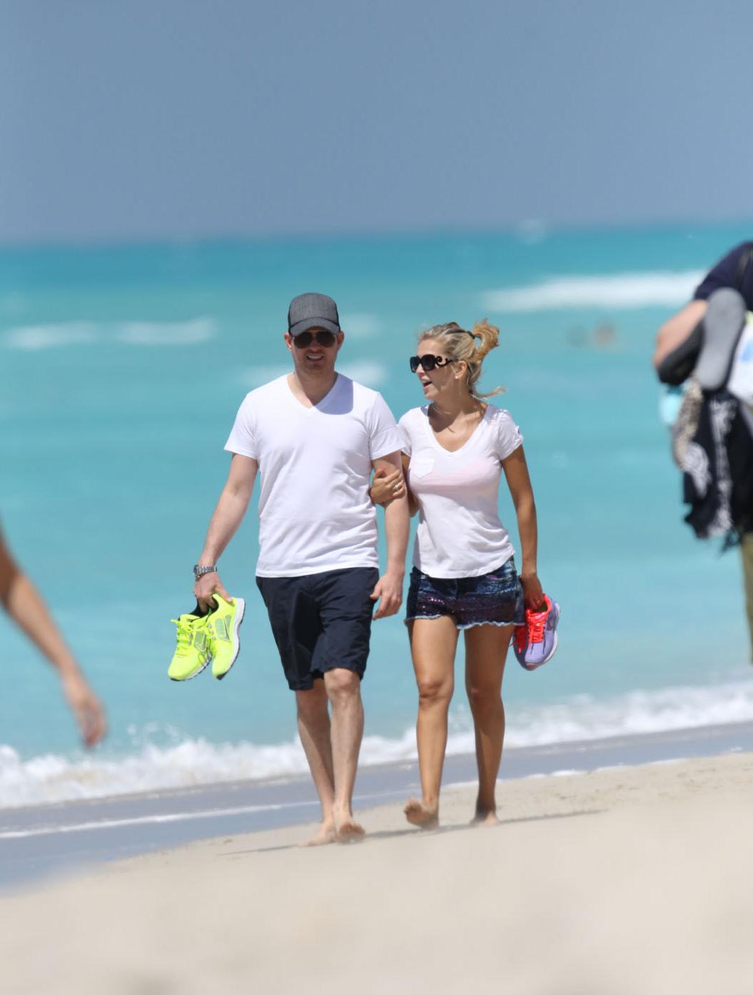 16P Luisana Lopilato in hotpants  c-thru T-shirt strolling down Miami Beach