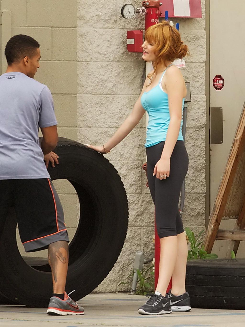 16P Bella Thorne wearing tiny blue top and leggings on the way at gym in Los Angeles