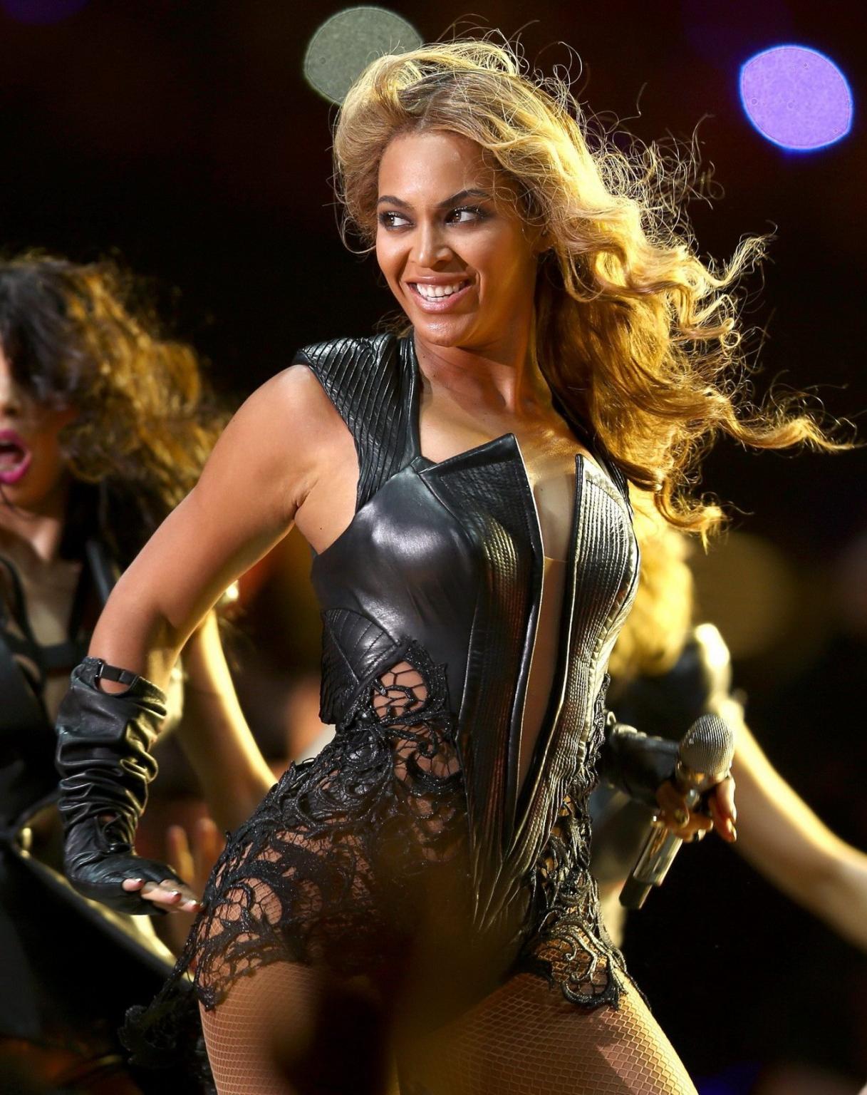 10P Beyonce Knowles performs in tiny leather bodysuit  fishnets during the Pepsi Sup