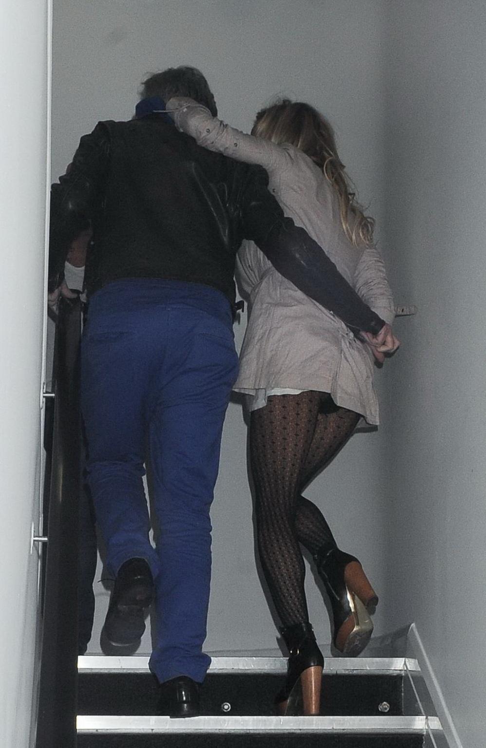 10P Pamela Anderson upskirt leaving 'Les Ambassadeurs Club' in London