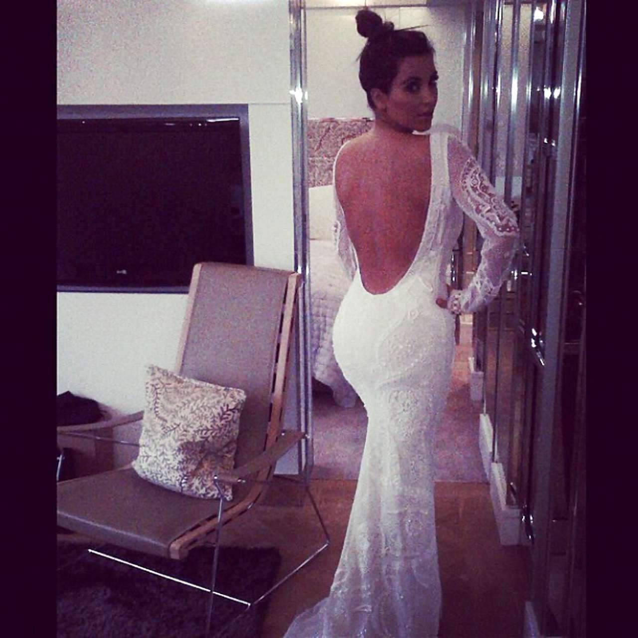 10P Kim Kardashian posing very sexy in lingerie and wedding dress