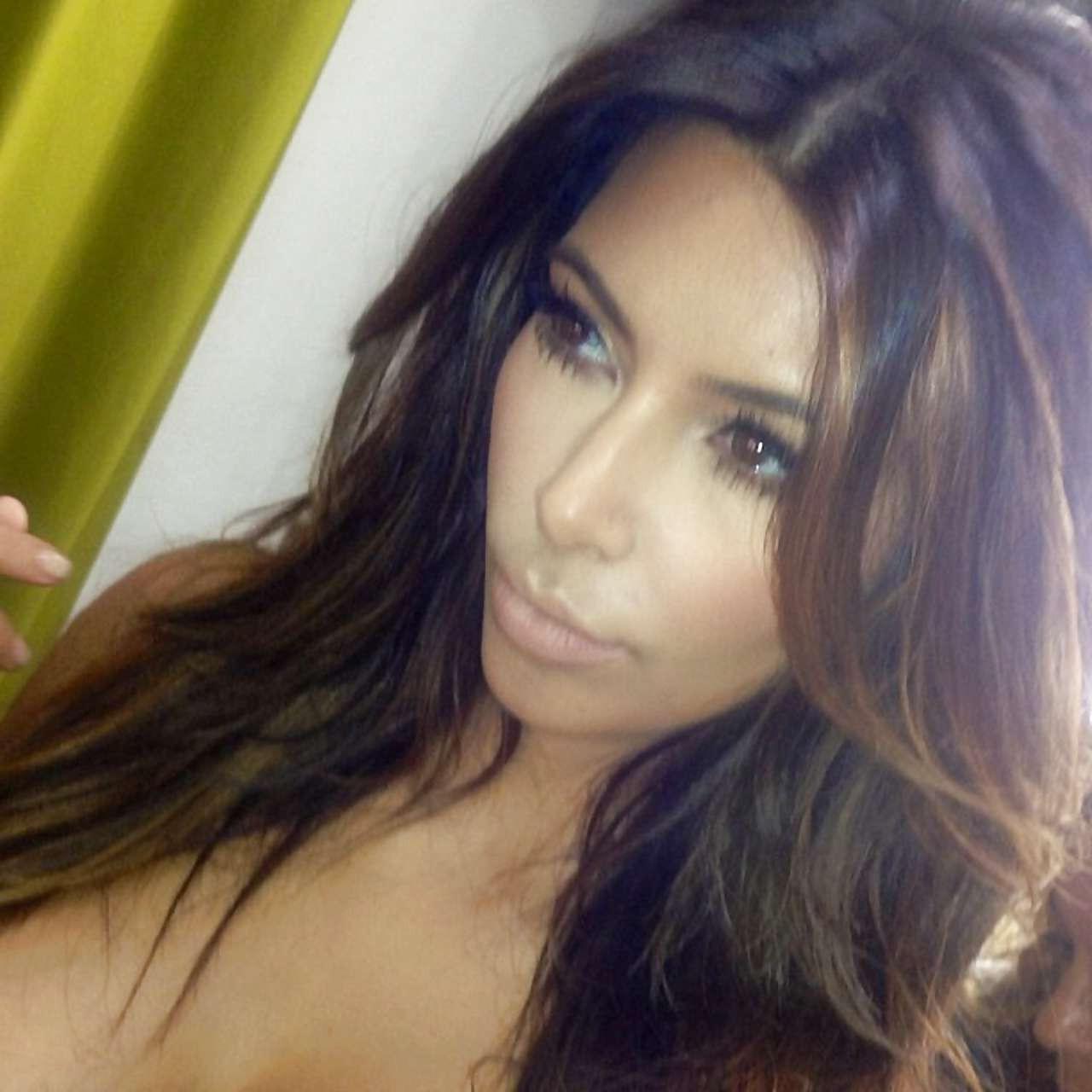 10P Kim Kardashian posing very sexy in lingerie and wedding dress