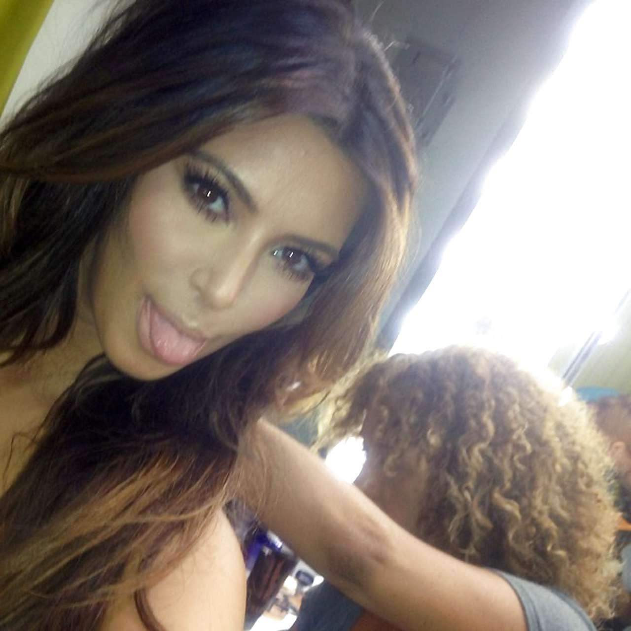 10P Kim Kardashian posing very sexy in lingerie and wedding dress