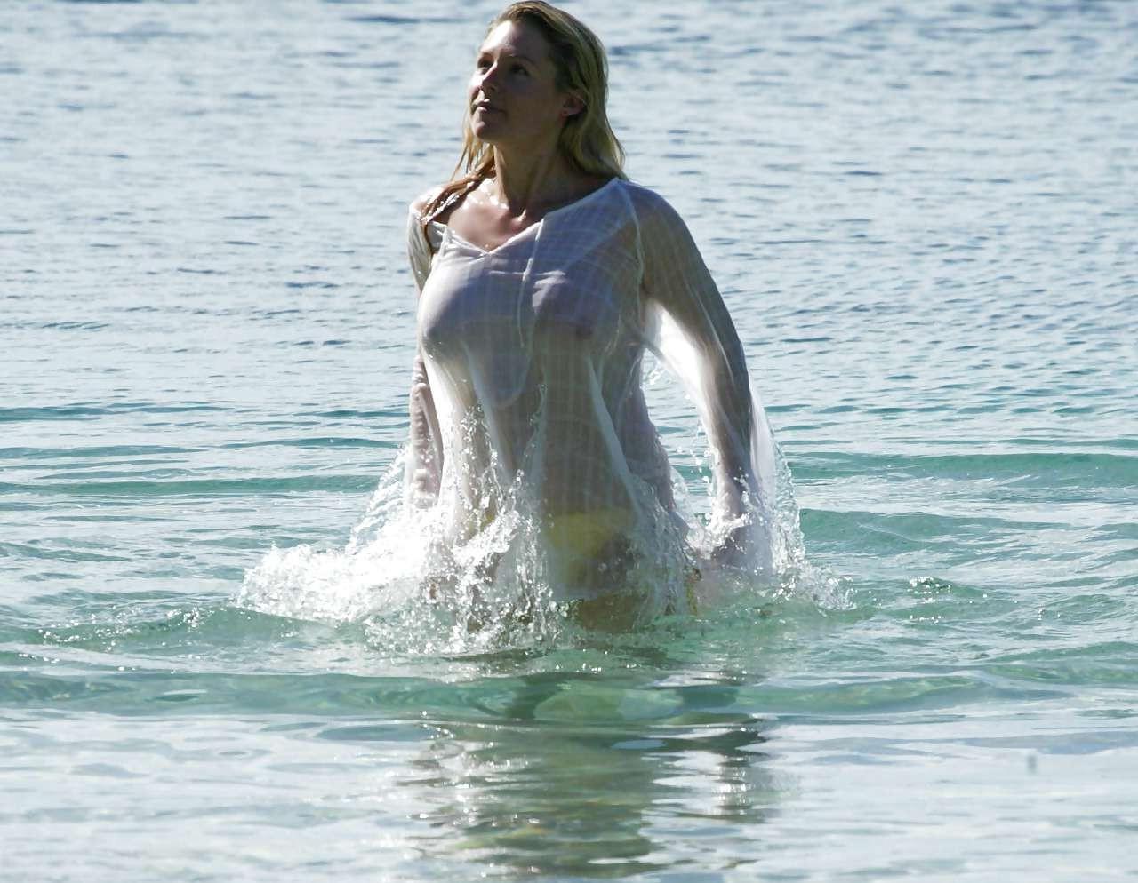 10P Abi Titmuss exposing her nice boobs in wet see thru dress