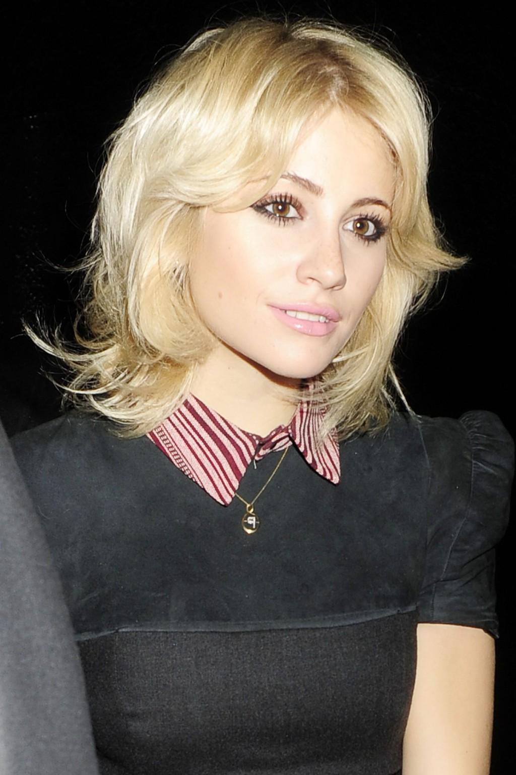 10P Pixie Lott flashing her panties outside the Rose Club in London