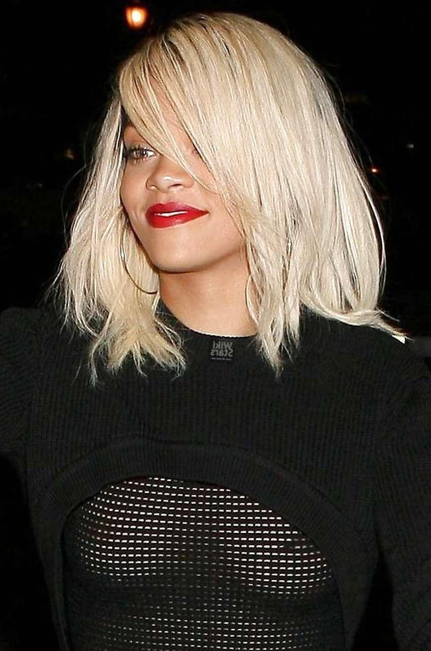 10P Rihanna showing her nice boobs in fishnet see thru top