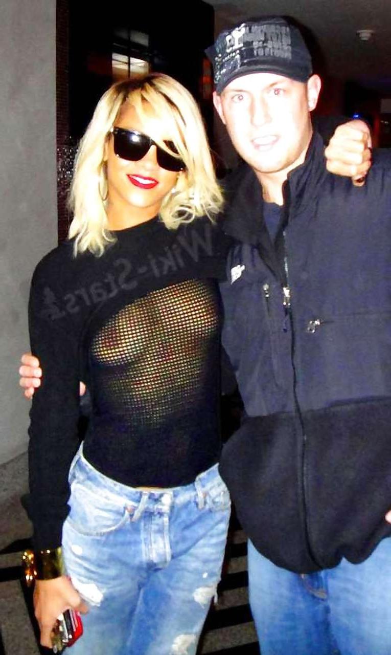 10P Rihanna showing her nice boobs in fishnet see thru top