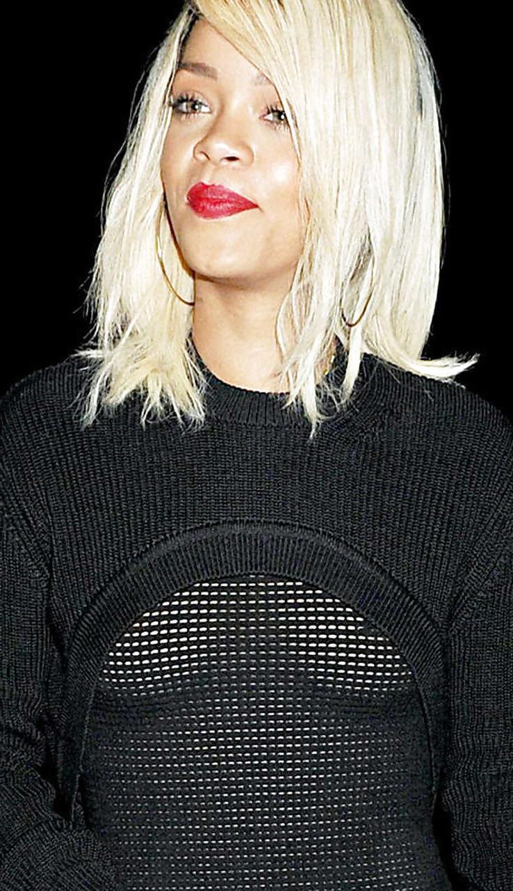 10P Rihanna showing her nice boobs in fishnet see thru top