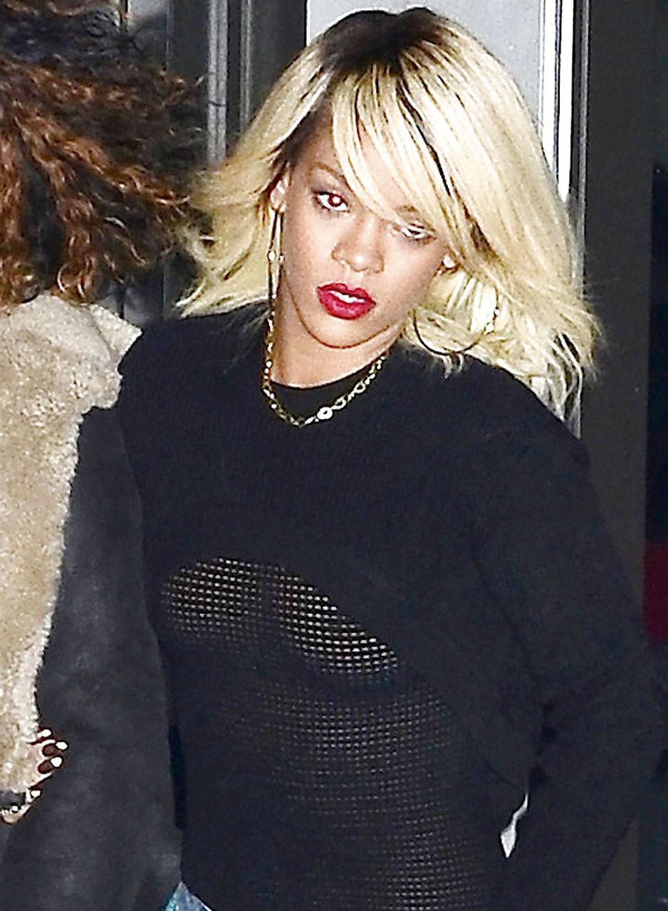 10P Rihanna showing her nice boobs in fishnet see thru top