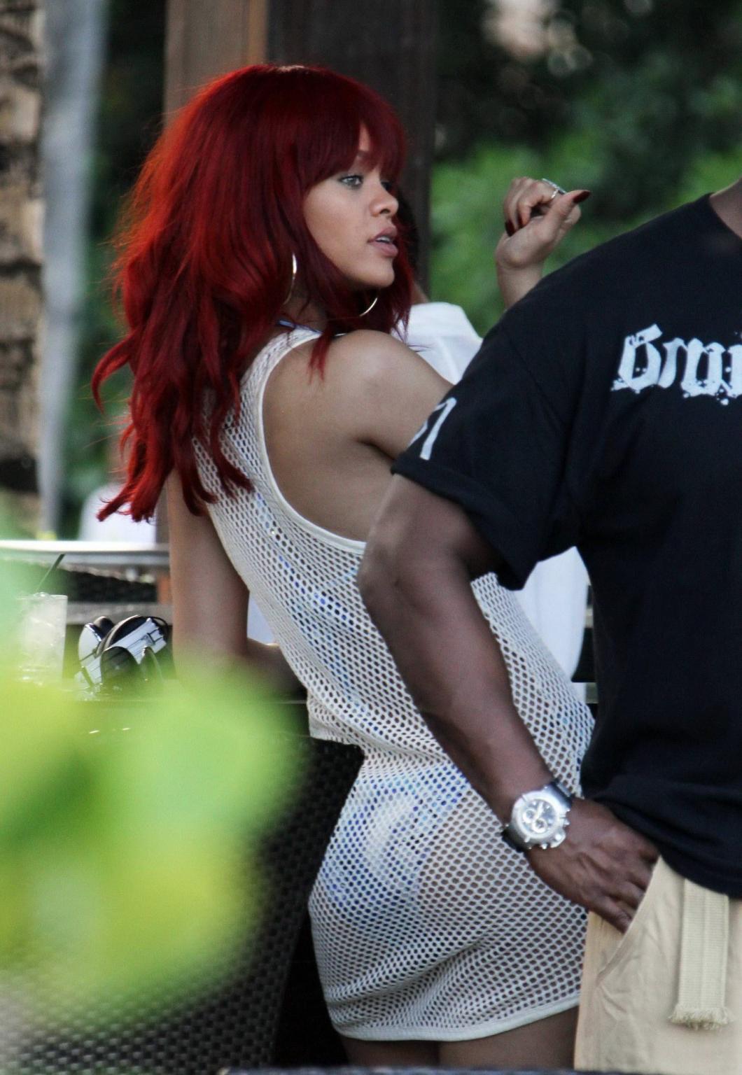 16P Rihanna wearing bikini  fishnet at the beach restaurant in Miami