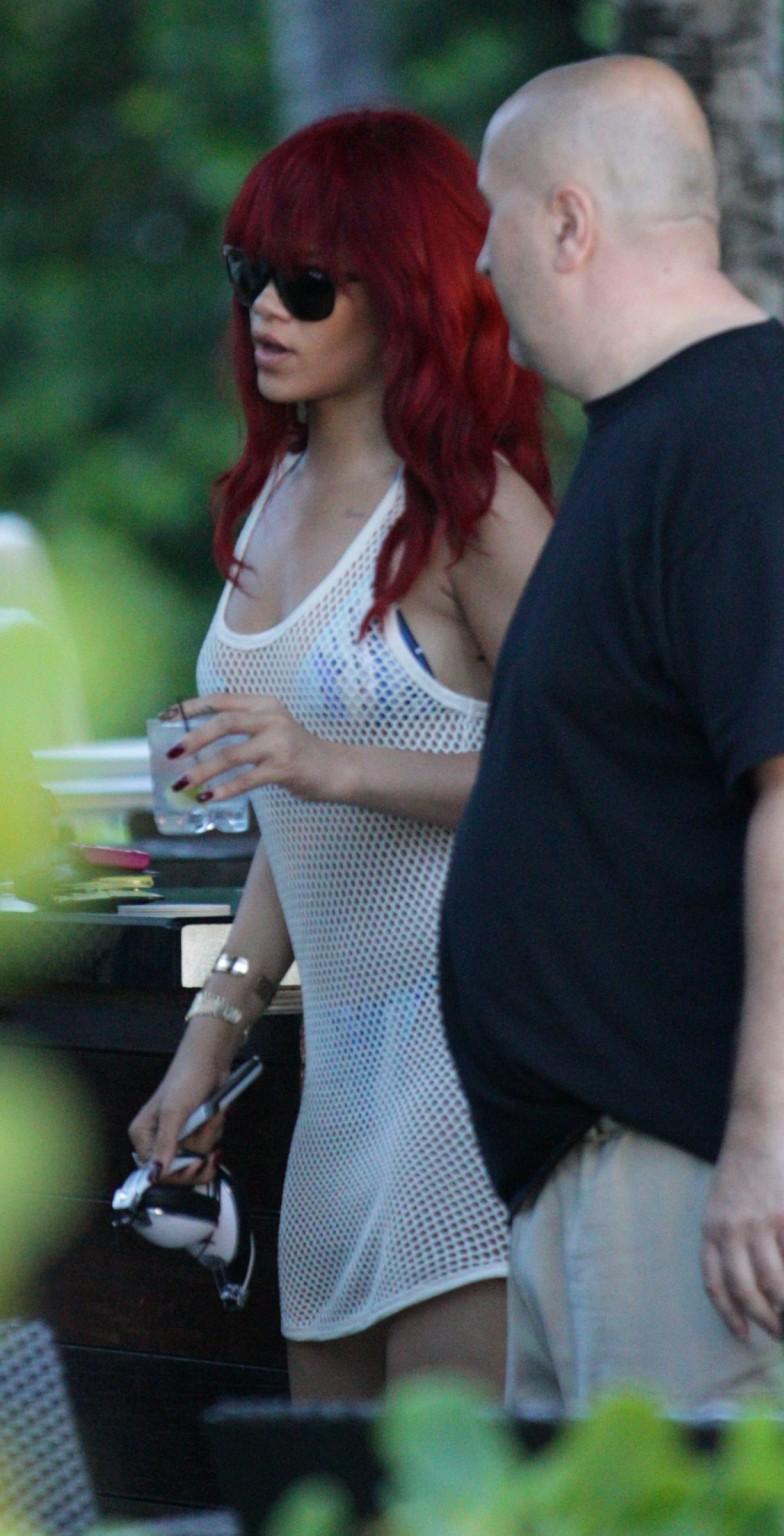 16P Rihanna wearing bikini  fishnet at the beach restaurant in Miami