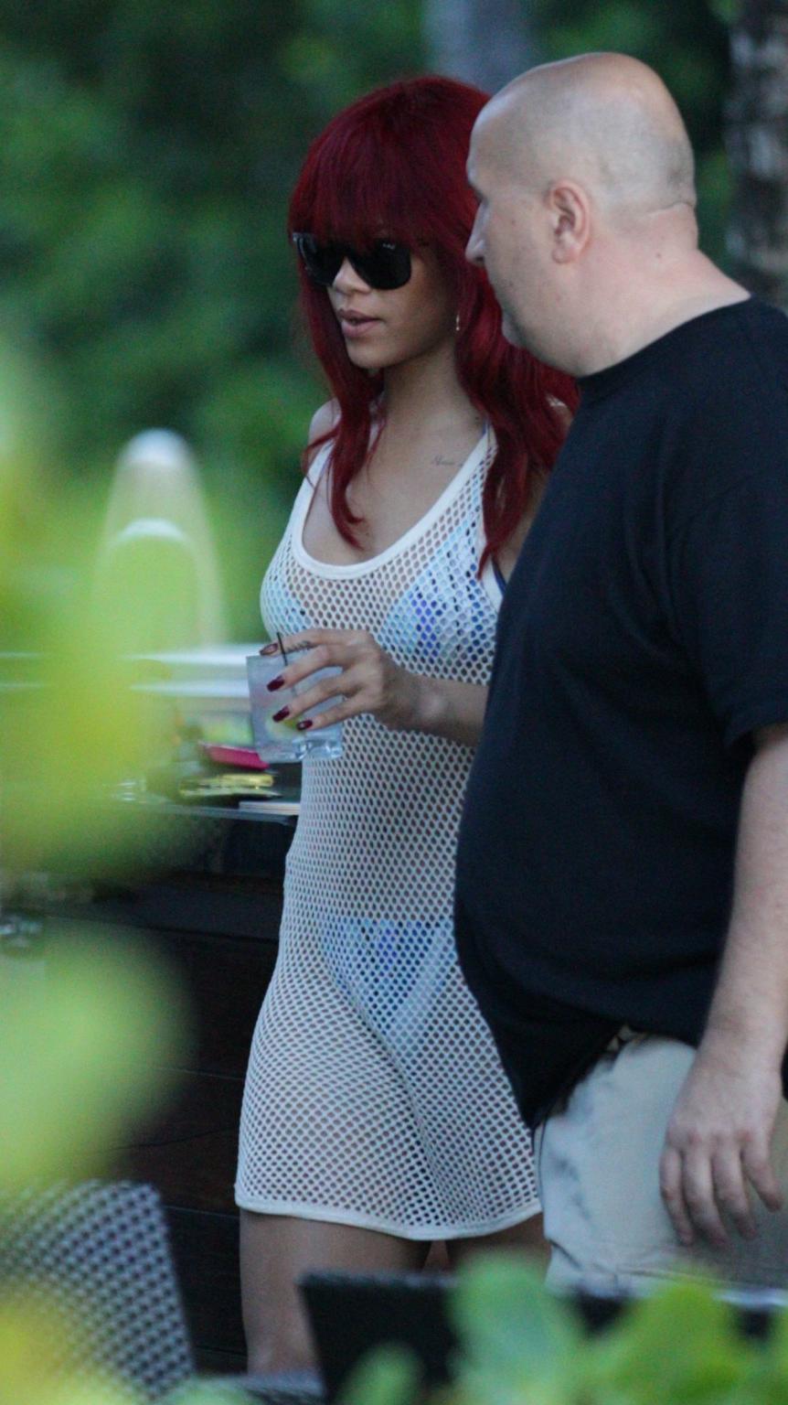 16P Rihanna wearing bikini  fishnet at the beach restaurant in Miami