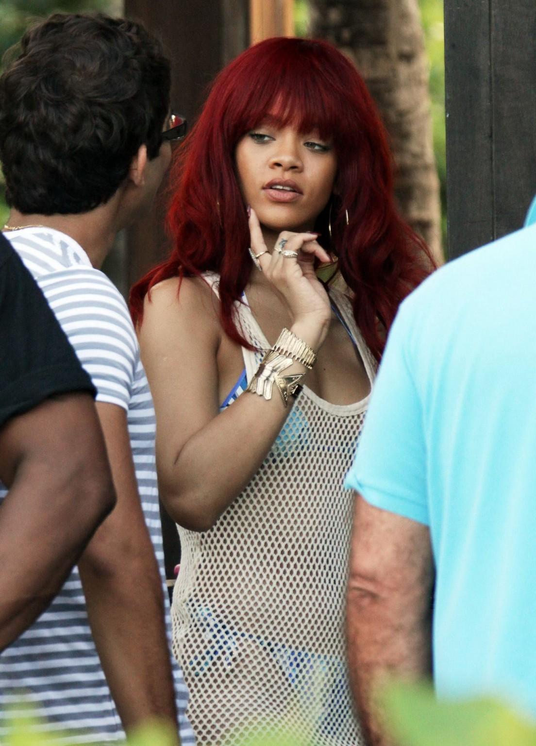16P Rihanna wearing bikini  fishnet at the beach restaurant in Miami