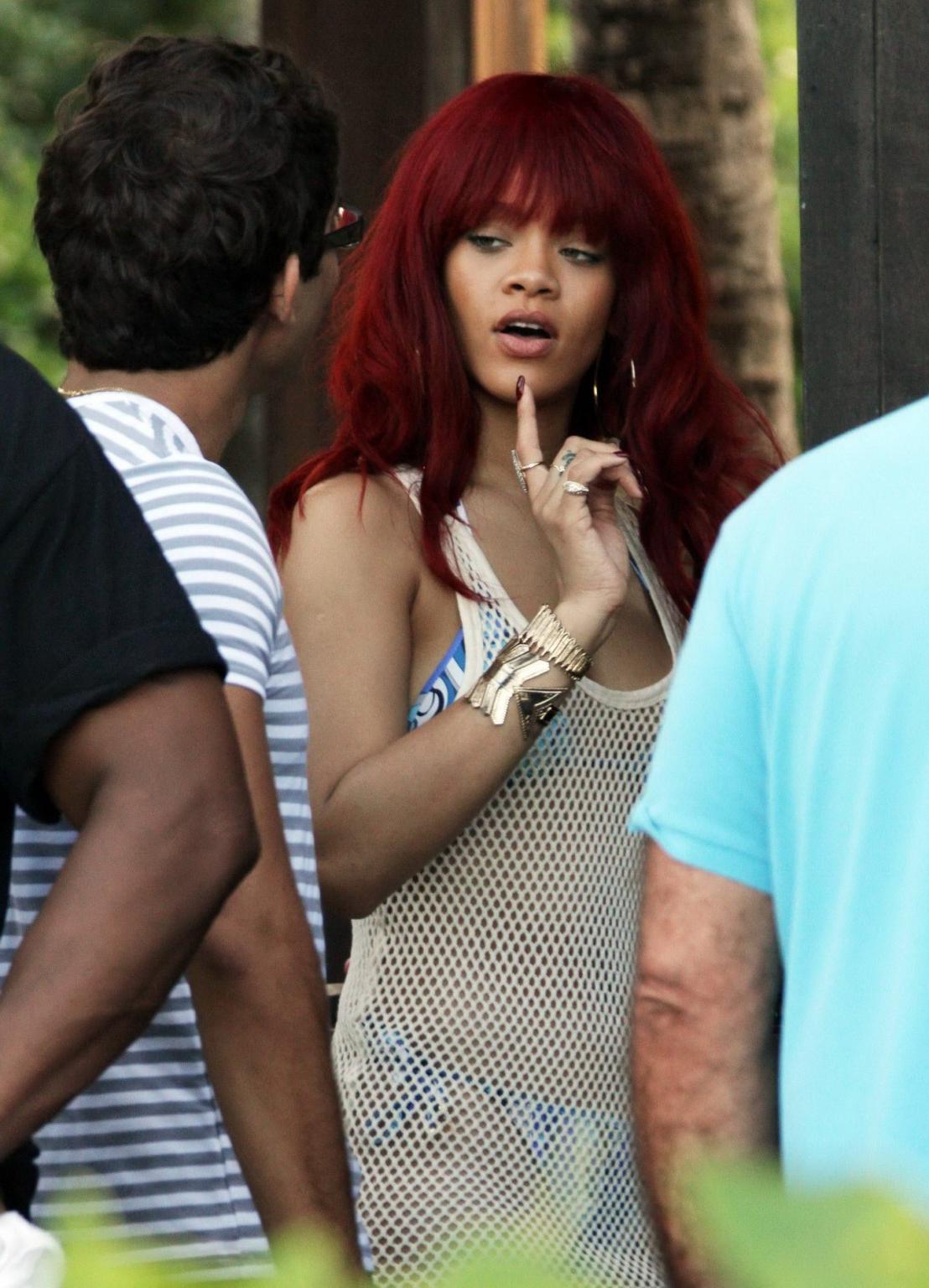 16P Rihanna wearing bikini  fishnet at the beach restaurant in Miami