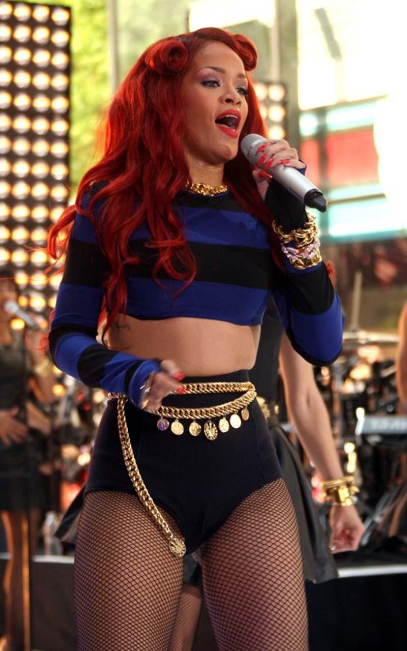 16P Rihanna very leggy in shorts and fishnet stockings on stage paparazzi pictures