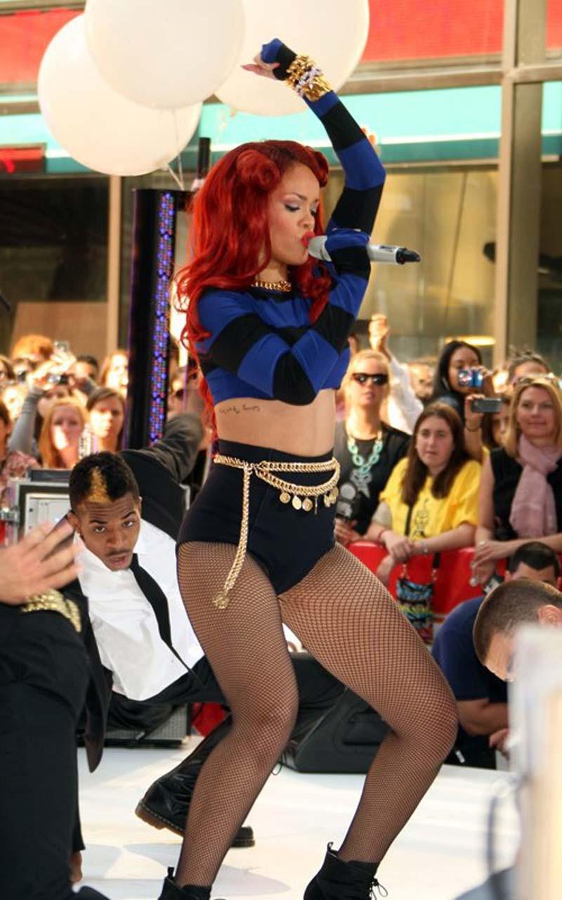 16P Rihanna very leggy in shorts and fishnet stockings on stage paparazzi pictures