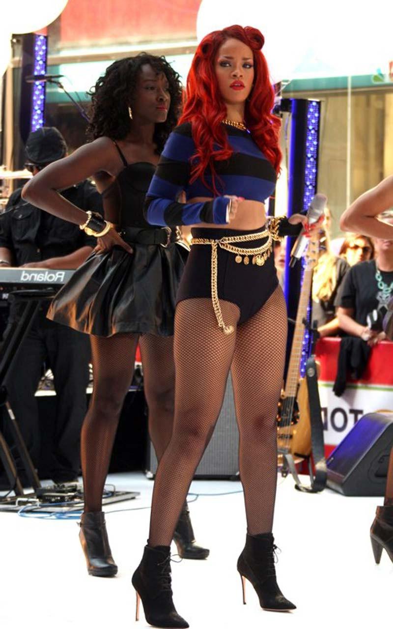 16P Rihanna very leggy in shorts and fishnet stockings on stage paparazzi pictures