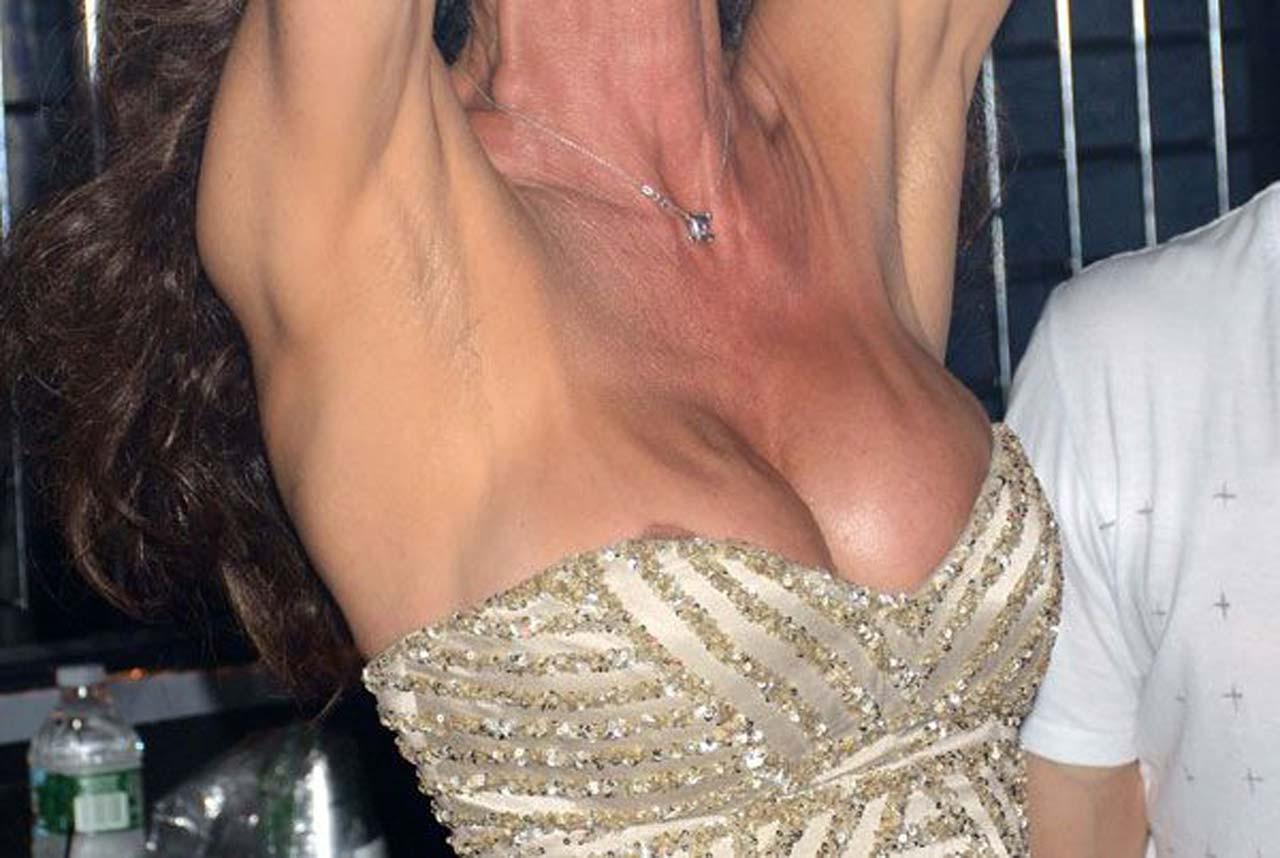 16P Janice Dickinson nipple slip while partying in club and upskirt paparazzi pictur