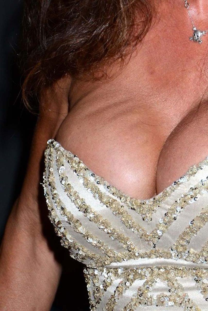 16P Janice Dickinson nipple slip while partying in club and upskirt paparazzi pictur
