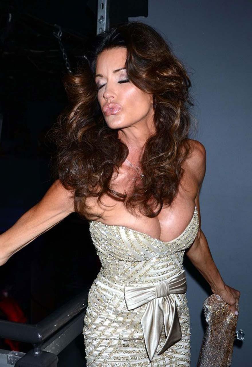 16P Janice Dickinson nipple slip while partying in club and upskirt paparazzi pictur