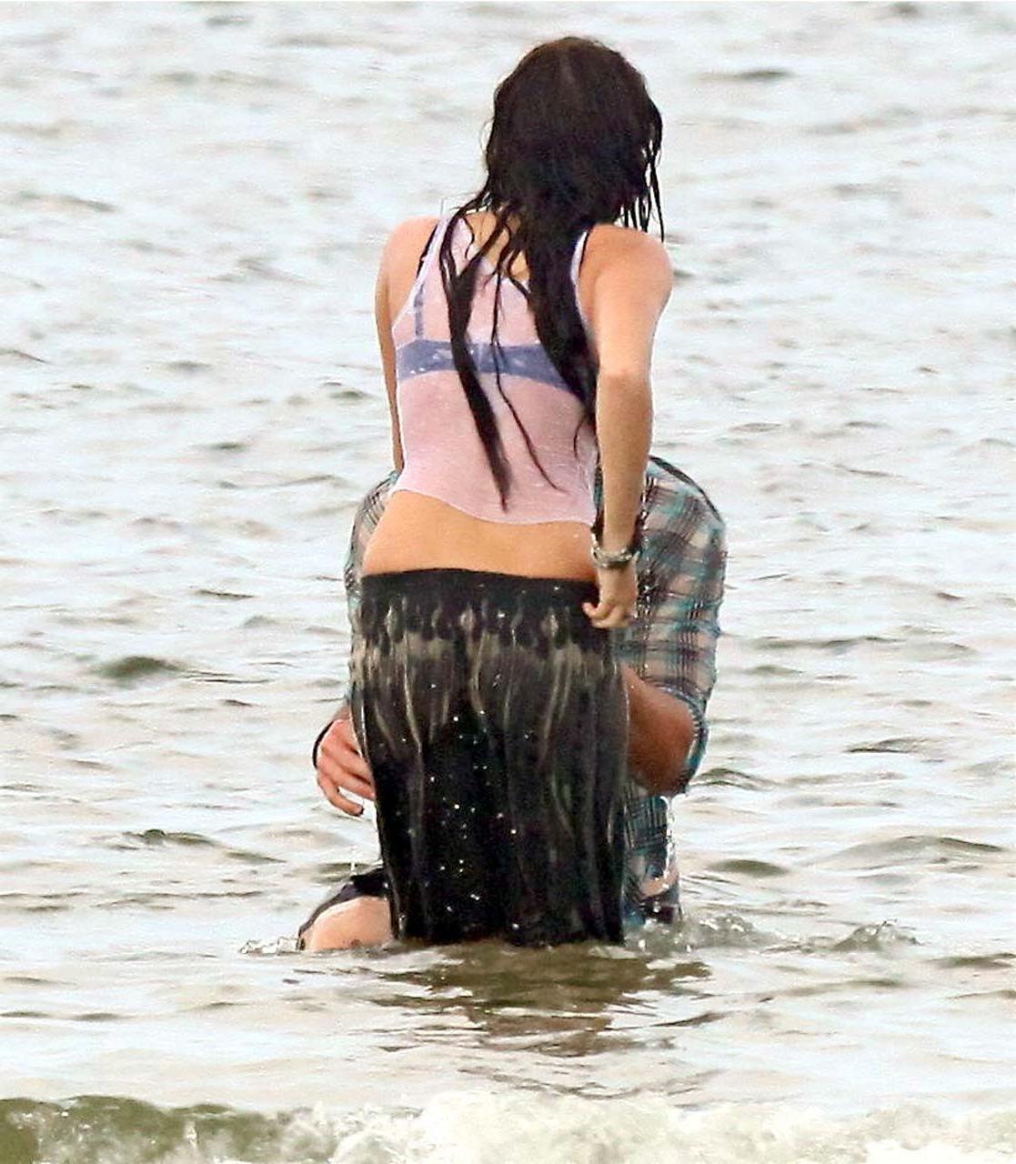 16P Miley Cyrus exposing her sexy body and nice boobs in wet clothes