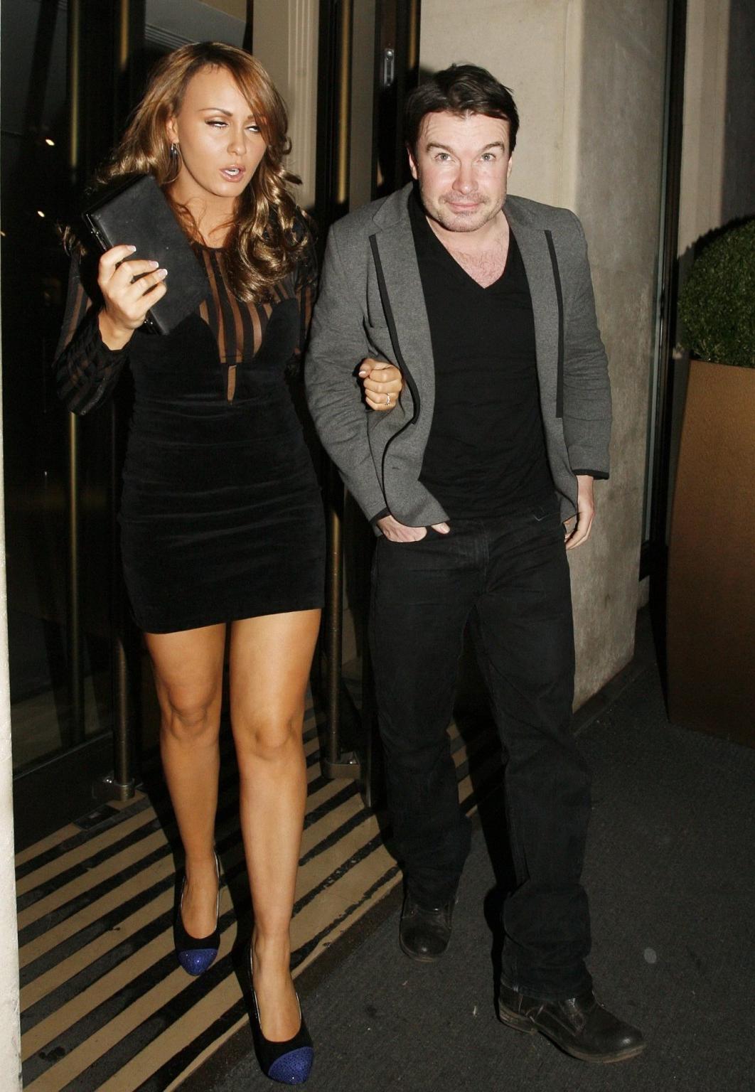 16P Chanelle Hayes leggy in black mini dress leaving a nightclub in London