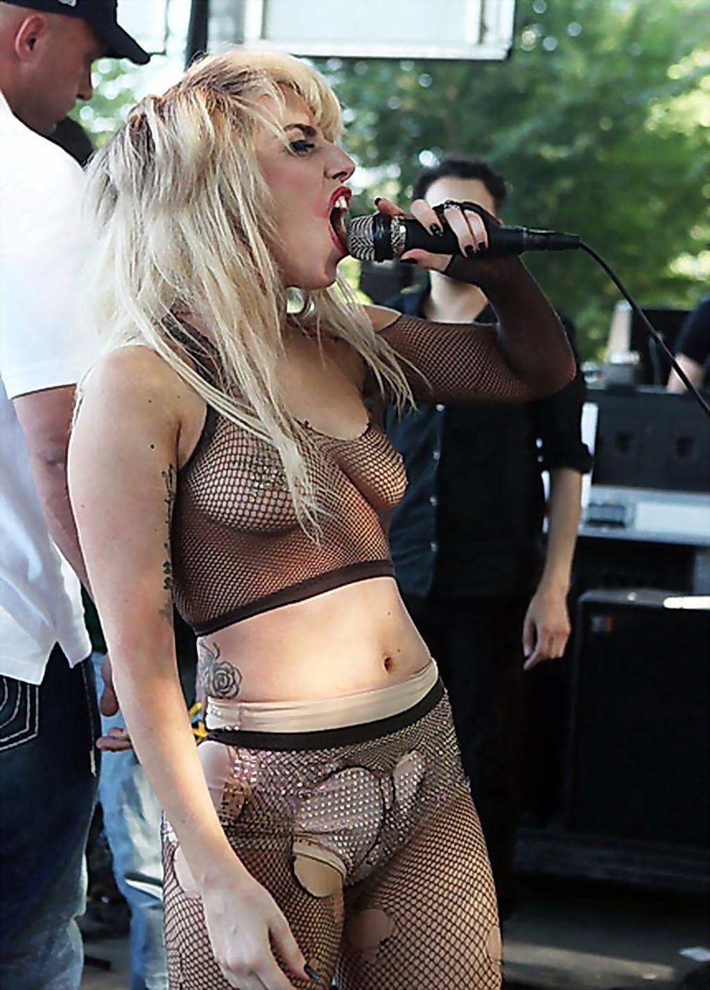 15P Lady Gaga crowd surfing at Lollapalooza wearing just fishnet  nip stickers
