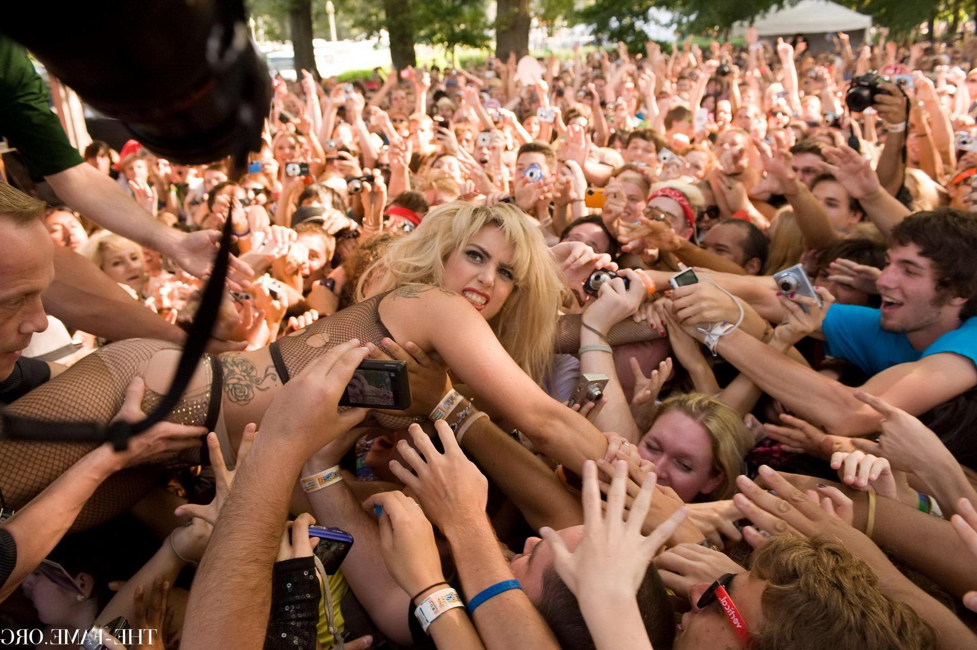15P Lady Gaga crowd surfing at Lollapalooza wearing just fishnet  nip stickers