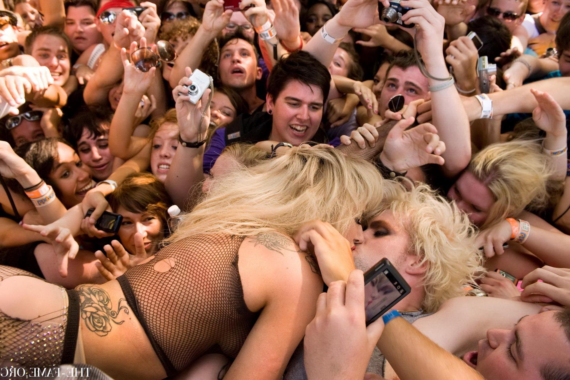 15P Lady Gaga crowd surfing at Lollapalooza wearing just fishnet  nip stickers