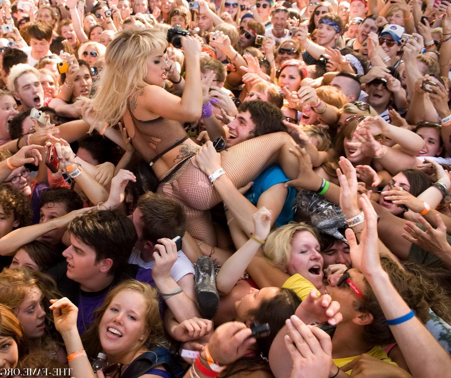 15P Lady Gaga crowd surfing at Lollapalooza wearing just fishnet  nip stickers