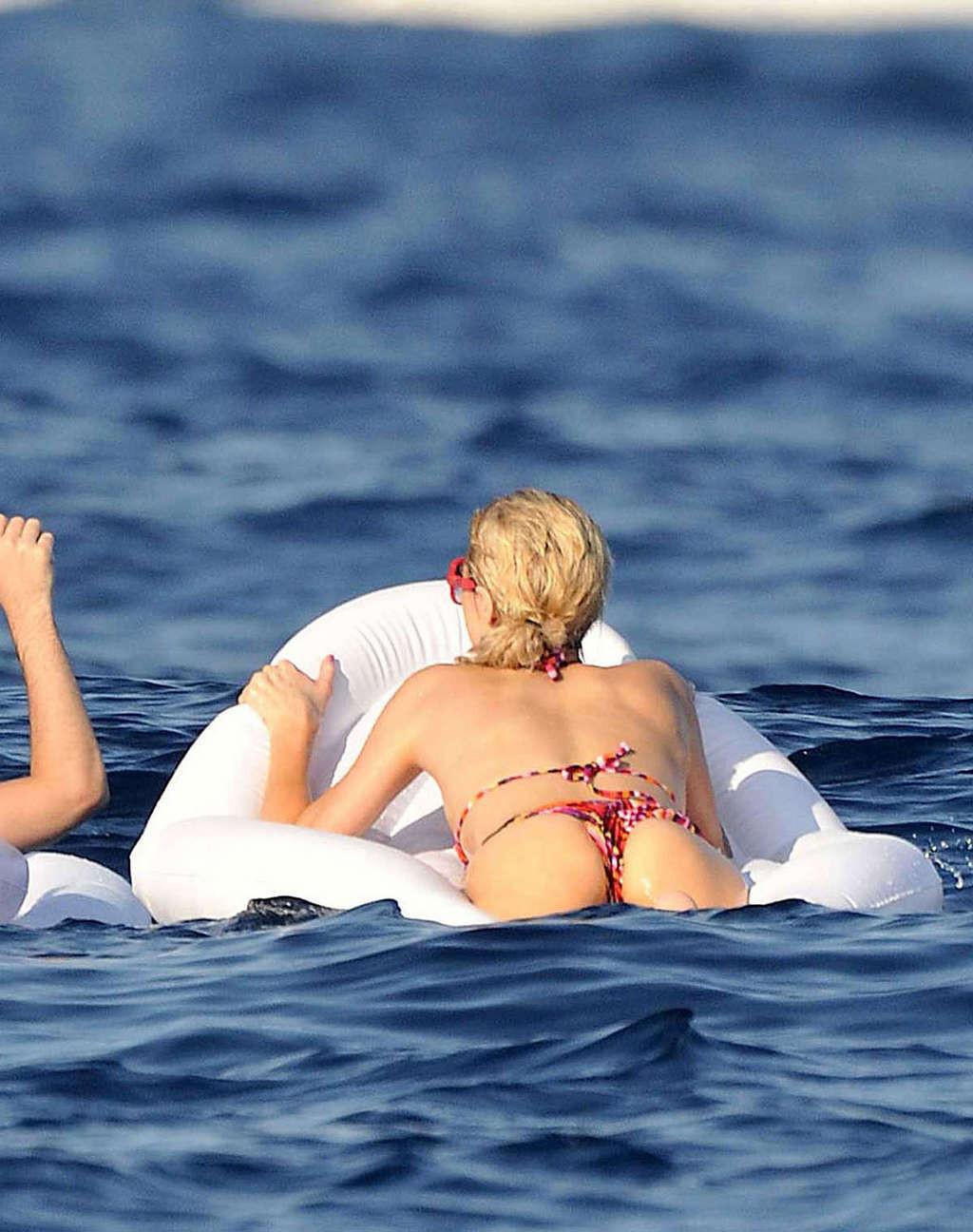 10P Paris Hilton jumping off the yacht in bikini and partying in nightclub paparazzi