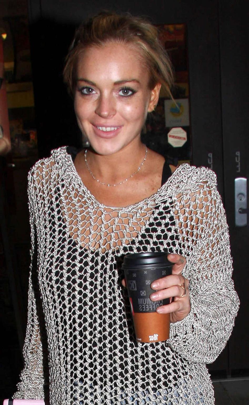 16P Lindsay Lohan in see thru fishnet dress and topless and upskirt