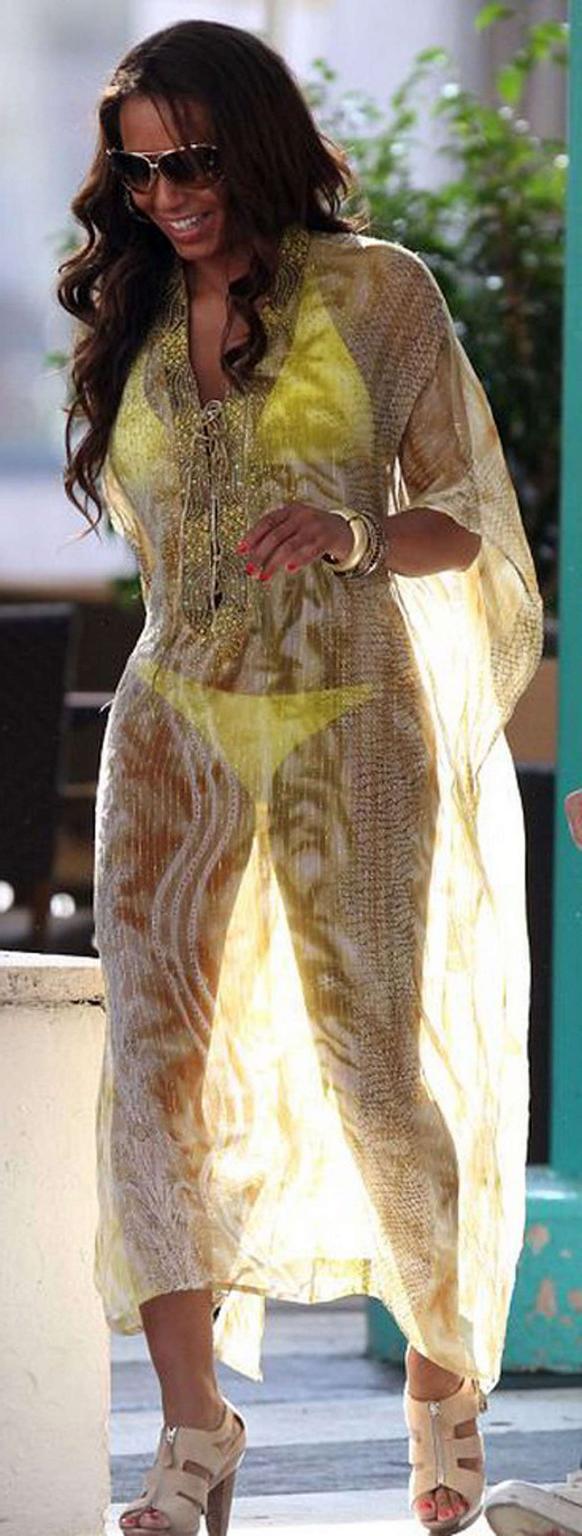 9P Melanie Brown showing her great body in fishnet outfit