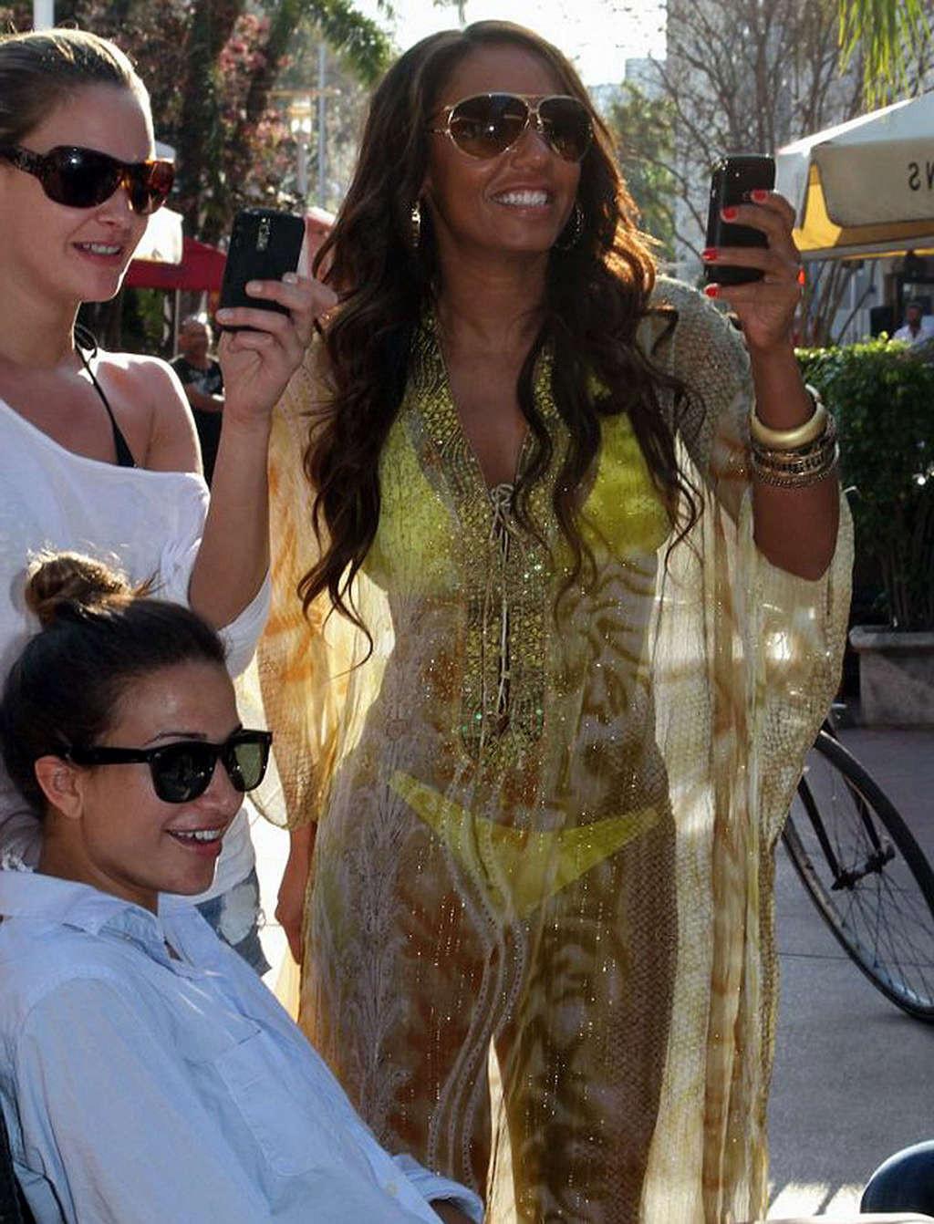 9P Melanie Brown showing her great body in fishnet outfit
