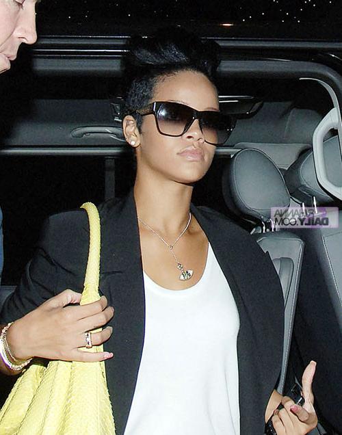 10P Rihanna in some sexy fishnet outfit and tits exposed in see thru dress paparazzi