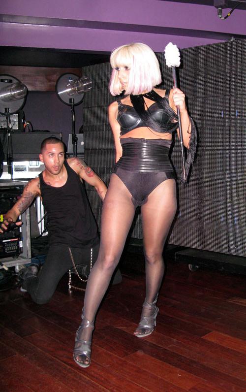 16P Lady Gaga posing very sexy in fishnet stockings and show great ass on stage
