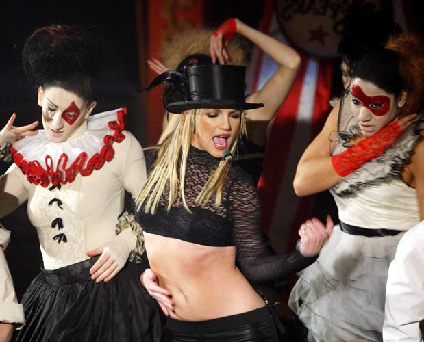 16P Britney Spears posing sexy in fishnet stockings