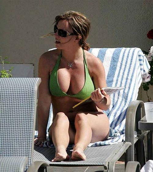 16P Britney Spears posing sexy in fishnet stockings