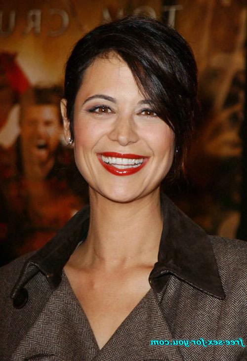 16P Catherine Bell posing sexy in bikini and in fishnet stockings