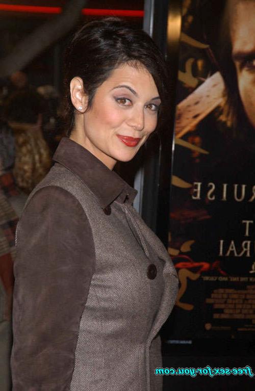 16P Catherine Bell posing sexy in bikini and in fishnet stockings
