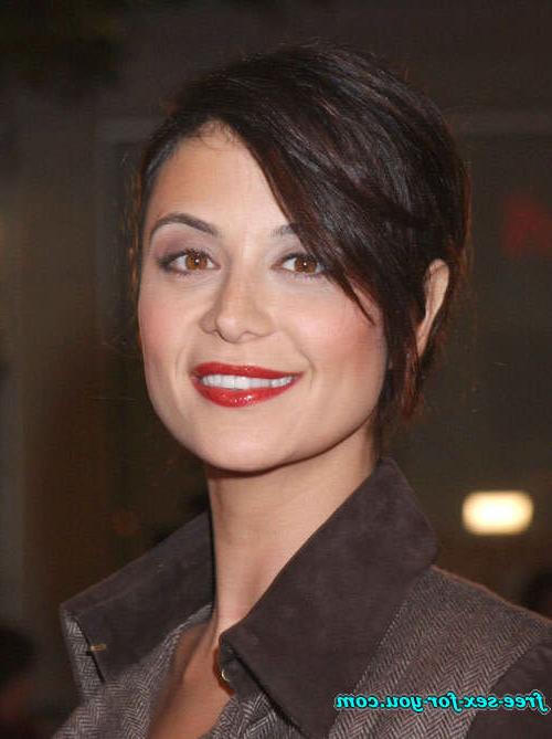 16P Catherine Bell posing sexy in bikini and in fishnet stockings