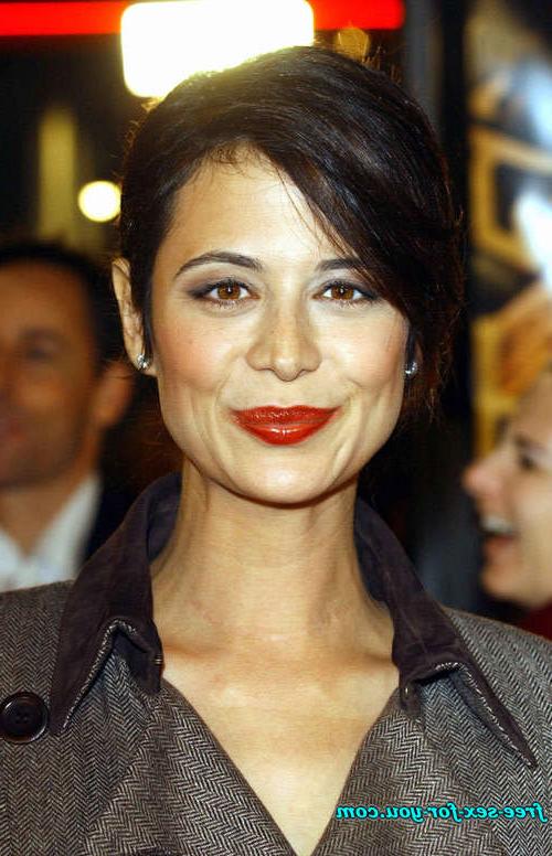 16P Catherine Bell posing sexy in bikini and in fishnet stockings
