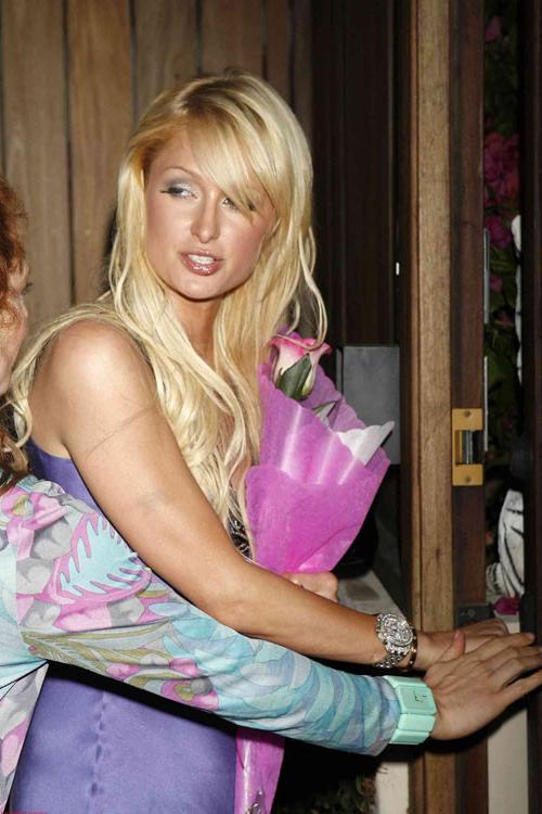 16P Paris Hilton posing sexy in see thru and in fishnet pantyhose