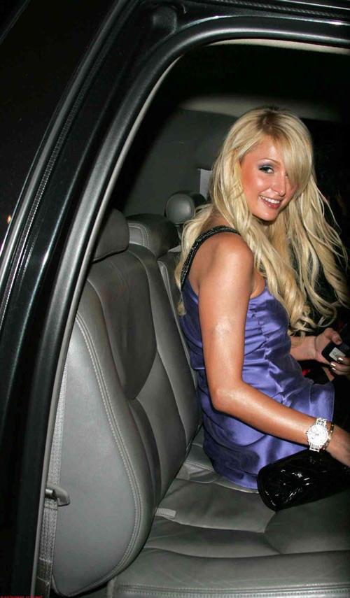16P Paris Hilton posing sexy in see thru and in fishnet pantyhose