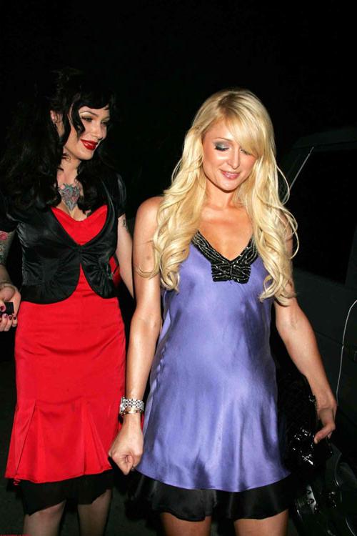 16P Paris Hilton posing sexy in see thru and in fishnet pantyhose