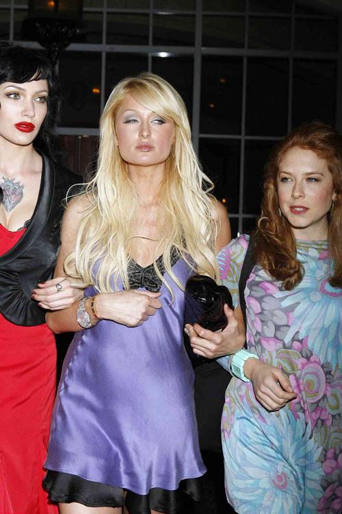 16P Paris Hilton posing sexy in see thru and in fishnet pantyhose
